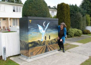 Mary Napper with a Chorus cabinet in Yarrow Street, Glengarry, that has received a welcome facelift.